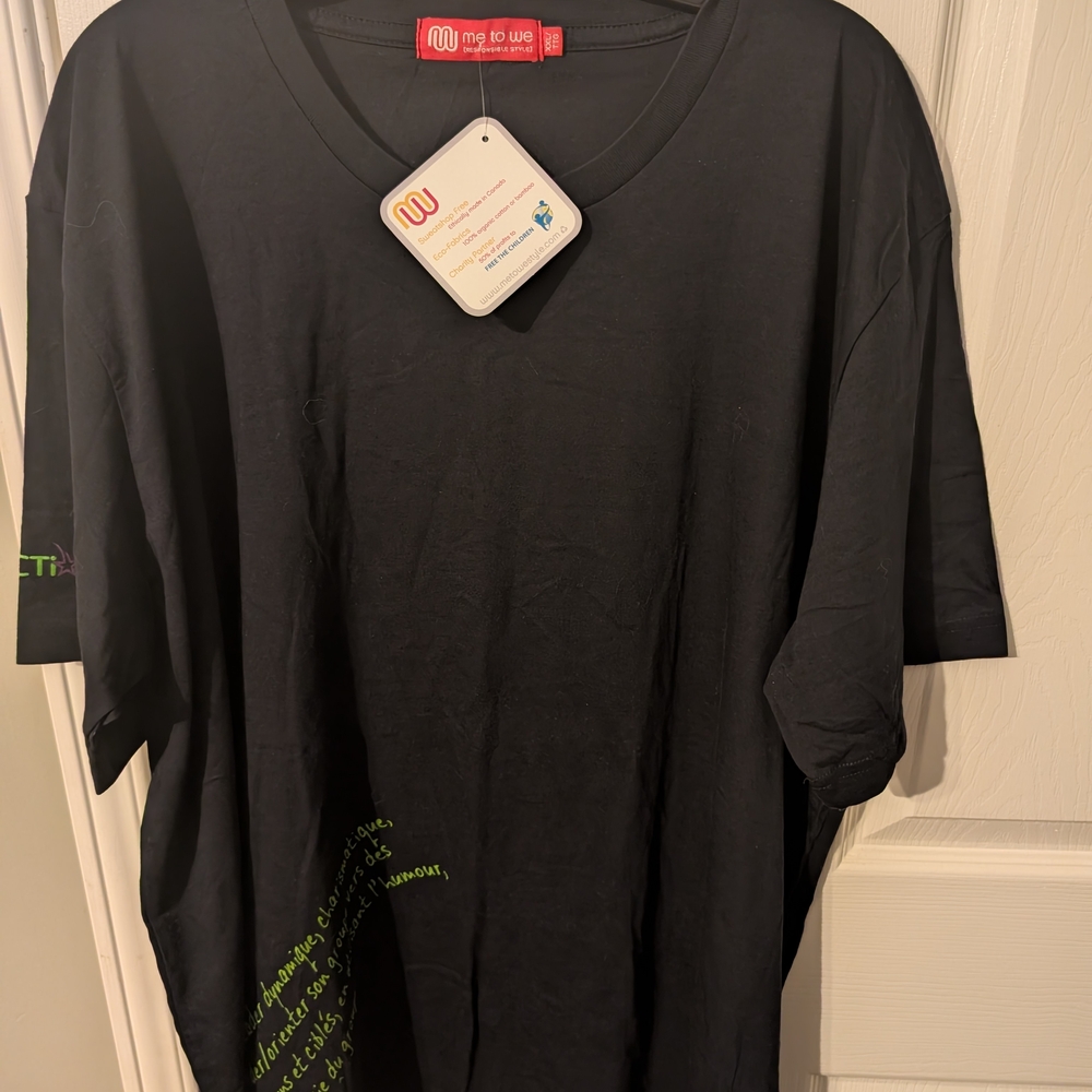 Me to We Black Tee with Green Accents